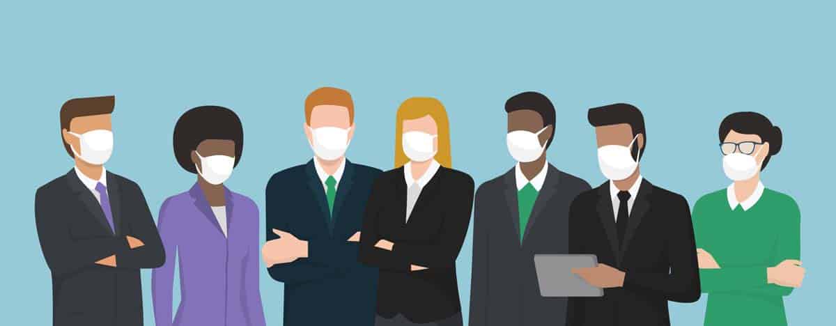 Business people wearing surgical masks and standing together Guidance for Employers on the Federal Families First Coronavirus Response Act and San Francisco’s Paid Sick Leave Ordinance